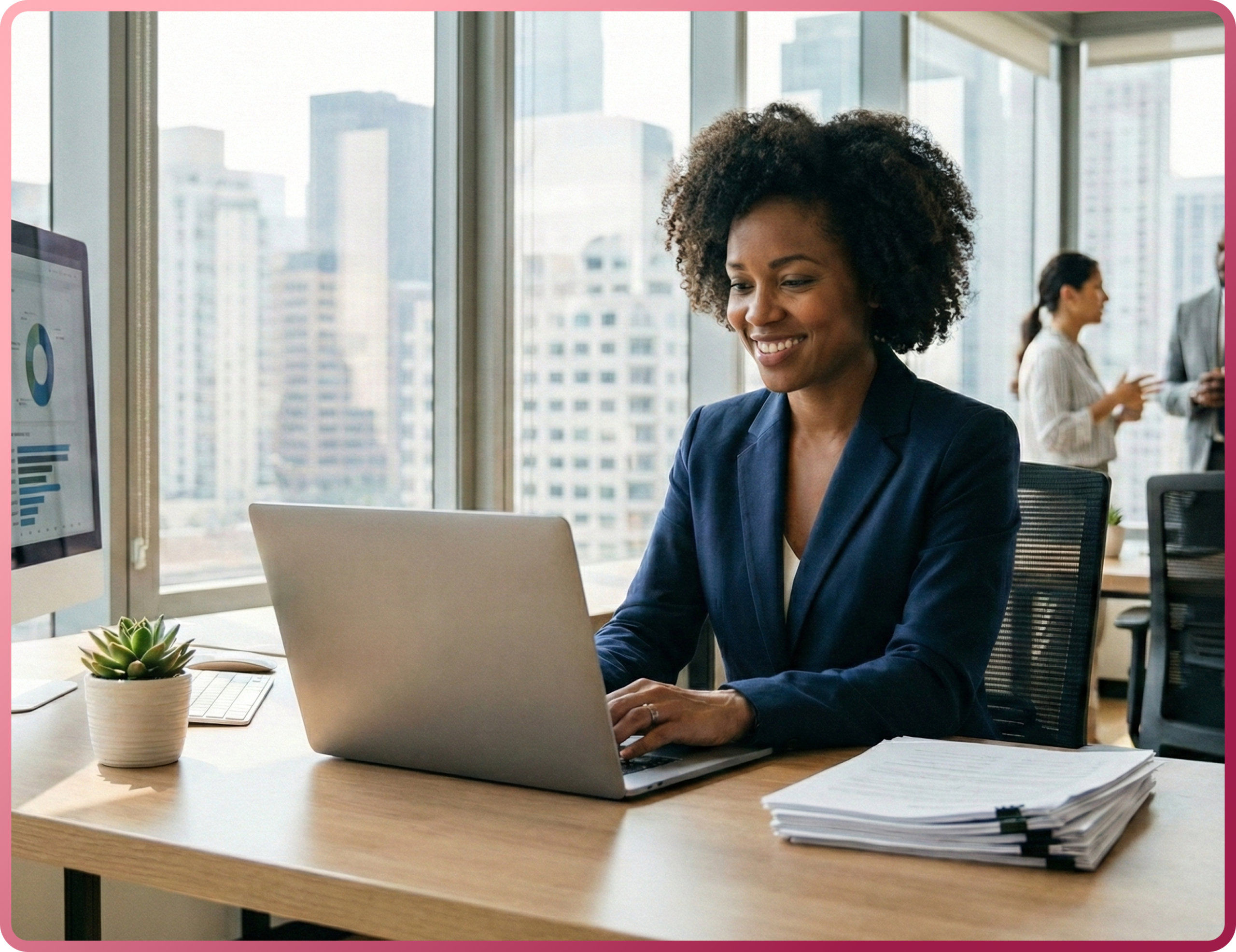 image 8 Smiling professional woman working on a laptop in a high-rise office